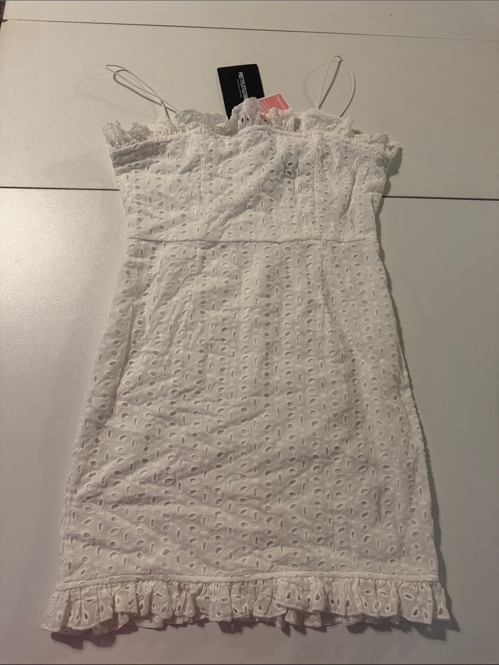 PrettyLittleThing White Eyelet Ruffle Mini Dress